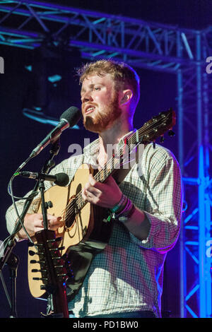 Sidmouth, UK. 5 August 2018.  Jack Rutter on the main festival stage. Beginning in 1955, Sidmouth Folk Week has dominated the folk scene for 63 years and now attracts ten of thousands of visitors to over 700 diverse events. Photo Central/Alamy Live News Stock Photo