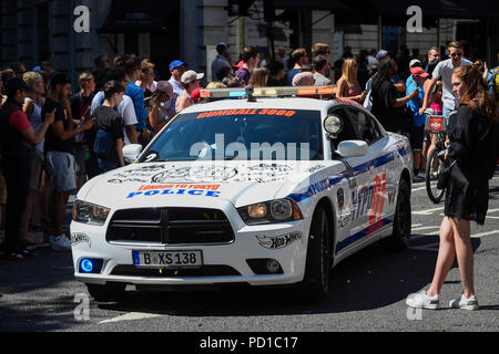 London, UK.  5 August 2018. A Dodge Hot Wheels inspired police car sets off from the start. Gumball 3000, a charity rally for supercars and more, including celebrity entrants, begins in Covent Garden with 150 participants beginning their journey from London to Tokyo.  Credit: Stephen Chung / Alamy Live News Stock Photo
