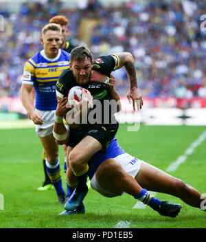 Bolton, UK. 5 August 2018. Ladbrokes Challenge Cup Rugby semi final, Warrington Wolves versus Leeds Rhinos; Daryl Clark of Warrington Wolves surges towards the try line Credit: Action Plus Sports Images/Alamy Live News Stock Photo