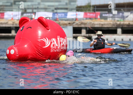 ExCel London, UK, 5th August 2018. Men's Elite swimmers at the turning point. The Men's and Women's Elite races attract a high class field of international athletes. Now in its 22nd year, the AJ Bell London Triathlon is the world’s largest triathlon, this year welcoming over 10,000 triathletes and elite racers. Credit: Imageplotter News and Sports/Alamy Live News Stock Photo