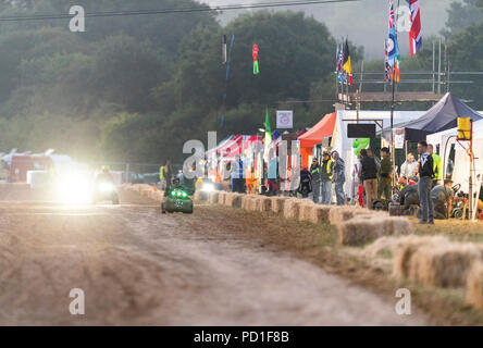 The 12 hour endurance lawnmower race, organised by the British Lawn Mower Racing Association, started at 8pm on Saturday and teams from around the world raced through the night to the finish line at 8am Sunday morning. Credit: Richard Grange/Alamy Live News Stock Photo