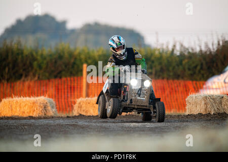 The 12 hour endurance lawnmower race, organised by the British Lawn Mower Racing Association, started at 8pm on Saturday and teams from around the world raced through the night to the finish line at 8am Sunday morning. Credit: Richard Grange/Alamy Live News  Stock Photo