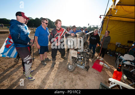 The 12 hour endurance lawnmower race, organised by the British Lawn Mower Racing Association, started at 8pm on Saturday and teams from around the world raced through the night to the finish line at 8am Sunday morning. 5th August 2018. Billingshurst, West Sussex. The 12 hour enduarance lawnmower race, organised by the British Lawn Mower Racing Association, started at 8pm on Saturday and teams from around the world raced through the night to the finish line at 8am Sunday morning. At 11 hours and 30 minutes, Northerners Kick Grass (pictured) were in the lead and set to win their 6th consecu Stock Photo