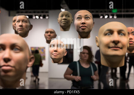 Seattle, Washington: "Probably Chelsea" on display during the Seattle Art Fair at CenturyLink Field Event Center. The work, by artist Heather Dewey-Hagborg, consists of thirty different possible portraits of Chelsea Manning algorithmically-generated by an analysis of her DNA. Chelsea Manning provided DNA samples that were extracted and analyzed to create 3d printed life size models of her portrait. Founded in 2015 by Paul G. Allen, the annual exhibition includes galleries from all over the globe as well as Seattle’s Foster/White, Linda Hodges and many others. Stock Photo