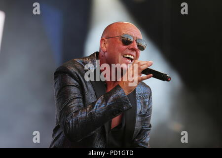 Siddington, Cheshire, UK. 5th August, 2018. Heaven 17 perform live on the Main Stage at Rewind North at Capesthorne Hall in Cheshire. Stock Photo