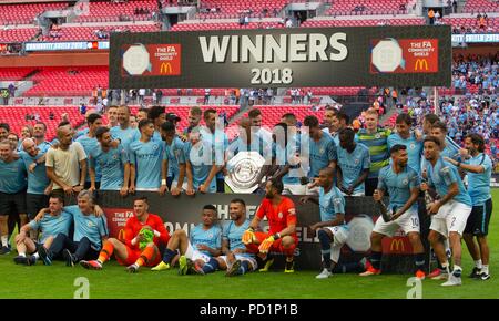 London, UK. 6th Aug, 2018. The winning team Manchester City celebrates after the Community Shield match between Chelsea and Manchester City at the Wembley Stadium in London, Britain on Aug. 5, 2018. Manchester City won 2-0. Credit: Marek Dorcik/Xinhua/Alamy Live News Stock Photo