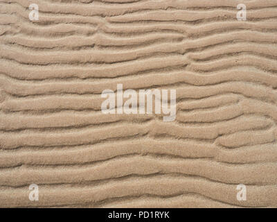 Wind formed sand pattern background Stock Photo