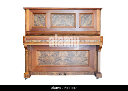 Vintage upright piano isolated on white background, front view