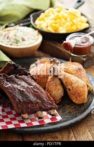 Grilled or smoked ribs and chicken Stock Photo