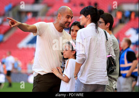 Manchester City manager Josep Guardiola with his family wife Cristina Serra and children Valentina Guardiola, Maria Guardiola and Marius Guardiola after the Community Shield match at Wembley Stadium, London. Stock Photo