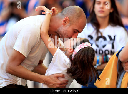 Manchester City manager Josep Guardiola celebrates with his daughter Valentina Guardiola after the Community Shield match at Wembley Stadium, London. Stock Photo