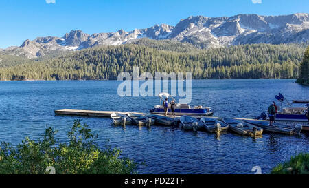 Dock at Lake Mary near the town of Mammoth Lakes, CA. Late afternoon. Stock Photo