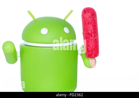 An Android figure with a popsicle Stock Photo