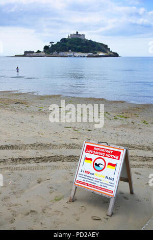 A board notice advising on safe swimming - John Gollop Stock Photo