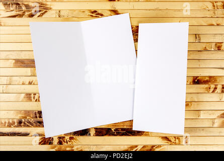 Blank booklet over bamboo background to replace your design Stock Photo