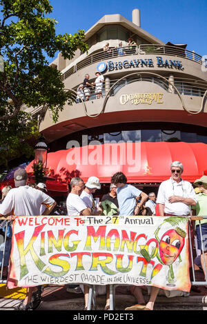 Miami Florida,Miami Dade County,Coconut Grove,King Mango Strut,annual,community parade,satire,parody,banner,group,crowd,funny,humor,humorous,humour,hu Stock Photo