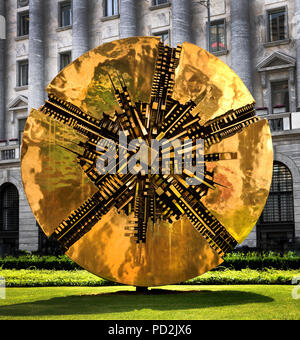 It’s called Il Grande Disco, the Great Disc, and sculpted by famed Italian artist Arnaldo Pomodoro.(The “Solar Wheel” (“Ruota Solare”), located in Piazza Meda ) Milan, Italy, Italian. Stock Photo