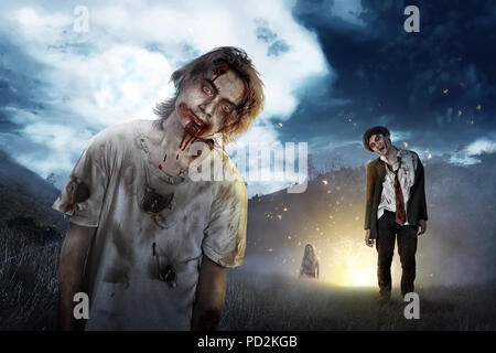 Group of zombies walking in outdoor at night. Halloween concept Stock Photo