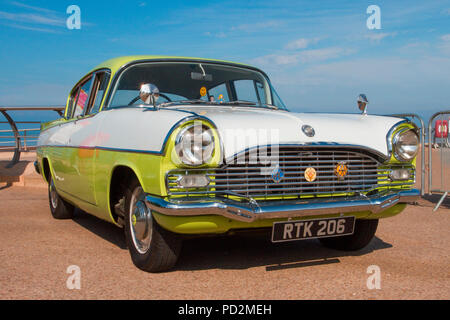 Yellow & white 1961 60s Vauxhall Cresta at Blackpool, UK. Collectible Cars, Classic Cars, Hot Rods, Sports Cars, Antique Cars, Custom Cars are the new investment vehicle of choice. Stock Photo