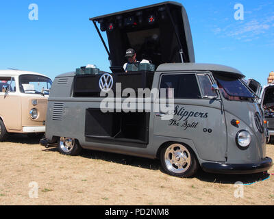 A vintage split screen VW camper van converted into a mobile DJ booth Stock Photo