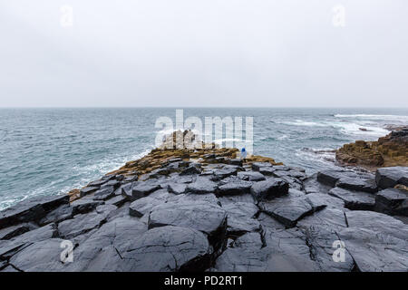 The harsh coastline of Staffa Island Stock Photo