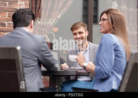 business colleagues discussing business issues at the coffee table Stock Photo