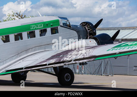 Dubendorf, Switzerland - May 6, 2015: partial view of a Junkers Ju-52 airplane of the JU-AIR at Dubendorf airport. JU-AIR is a Swiss company homed at  Stock Photo