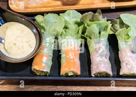Salad rolls with dipping sauce Stock Photo