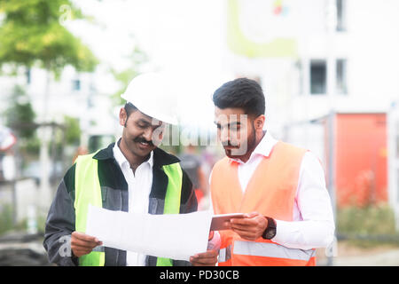 Engineers working on site Stock Photo