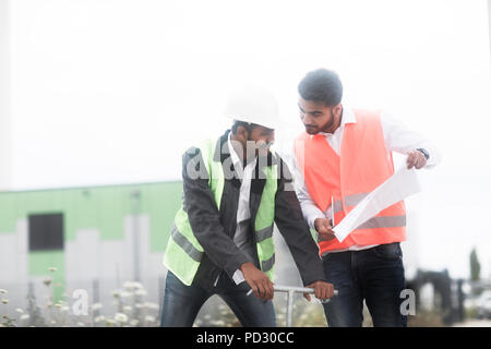 Engineers working on site Stock Photo