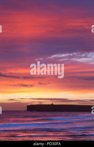 Dramatic sunlit clouds following a summer sunset at Birsay, Orkney Stock Photo