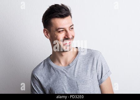 Portrait of a young man in a studio. Copy space. Stock Photo