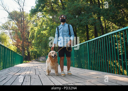Morning walk with dog. Stock Photo