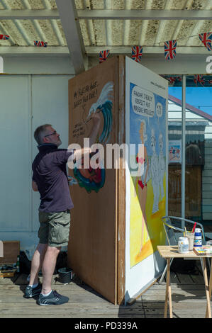 Cartoonist at the Pier Herne Bay as part of the Herne Bay Cartoon Festival Held Annually Stock Photo