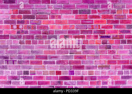 Close-up of brick wall with purple, pink, fuchsia, ultra violet, black color brick background Stock Photo