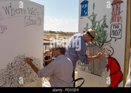 Cartoonist at the Pier Herne Bay as part of the Herne Bay Cartoon Festival Held Annually Stock Photo