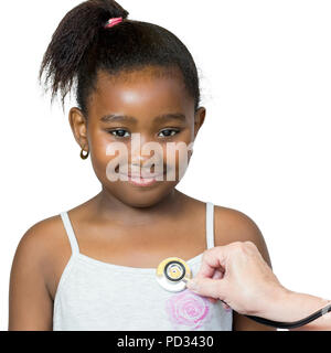 Close up portrait of cute little african girl having heartbeat taken.Hand positioning stethoscope against chest.Isolated on white background. Stock Photo