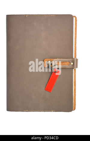 Blank leather notebook cover with tag on white background Stock Photo