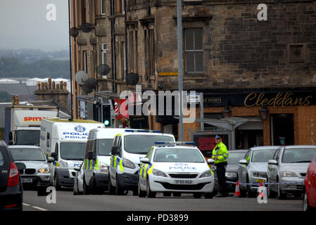 Glasgow, Scotland, UK 6th Kilbowie road in Clydebank is the scene  for the latest murders in the Glasgow area. One man died and another injured as masses of police descended on the town last night to seal off the scene as the first floral tribute appeared early this morning..  Gerard Ferry/Alamy news Stock Photo