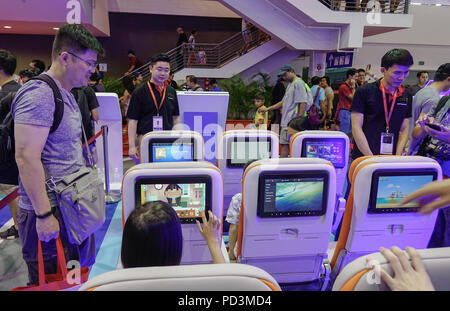 Singapore - Feb 11, 2018. People visit the aviation equipment exhibition in Changi, Singapore. Stock Photo