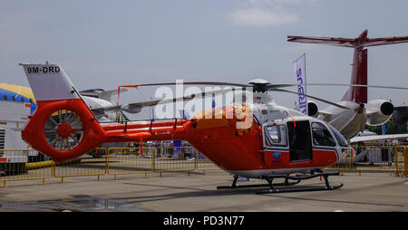 Singapore - Feb 10, 2018. Modern helicopter on display the aviation equipment exhibition in Changi, Singapore. Stock Photo