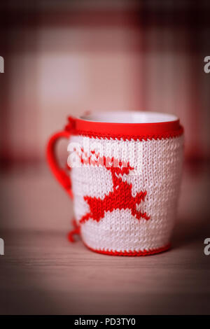 decorative Christmas Cup on wooden background. Stock Photo