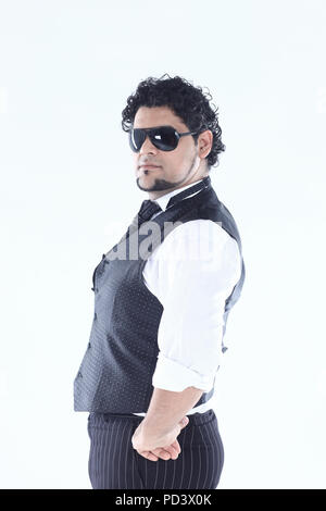 portrait of a DJ in a stylish black glasses on a white background Stock Photo