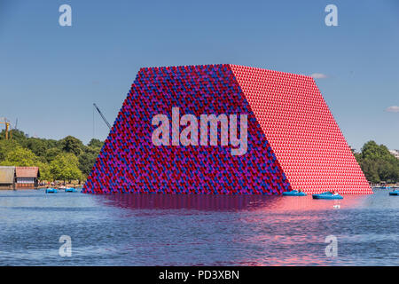 The Serpentine Lake in Hyde Park with London Mastaba created by Christo. London, England, United Kingdom, Europe Stock Photo