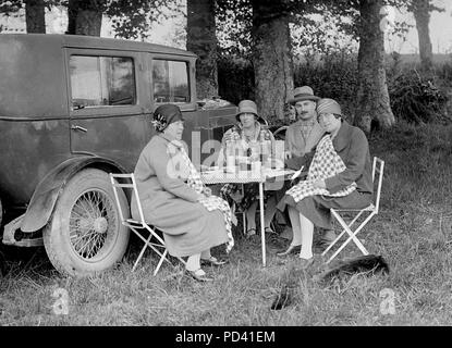 Tea time during a road trip,  ca. 1915. Stock Photo