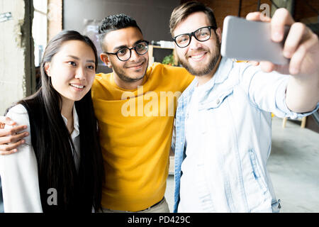 Multi-Ethnic Group  of Young  People Taking Selfie Stock Photo