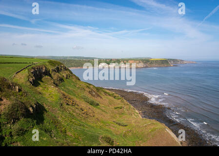 View from the cliffs at Kettleness of Runswick Bay on the coast of North Yorkshire, England. A section of the Cleveland Way coast path. Stock Photo