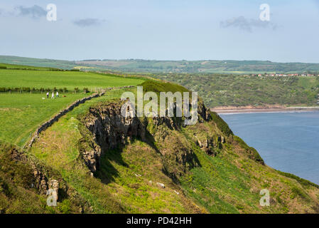 View from the cliffs at Kettleness of Runswick Bay on the coast of North Yorkshire, England. A section of the Cleveland Way coast path. Stock Photo