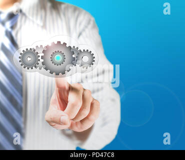 Cloud computing service concept, business man touch cloud with gears inside for launching Stock Photo