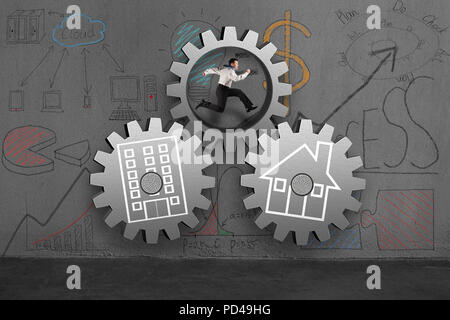 Man running in concrete gear with home and office doodles Stock Photo